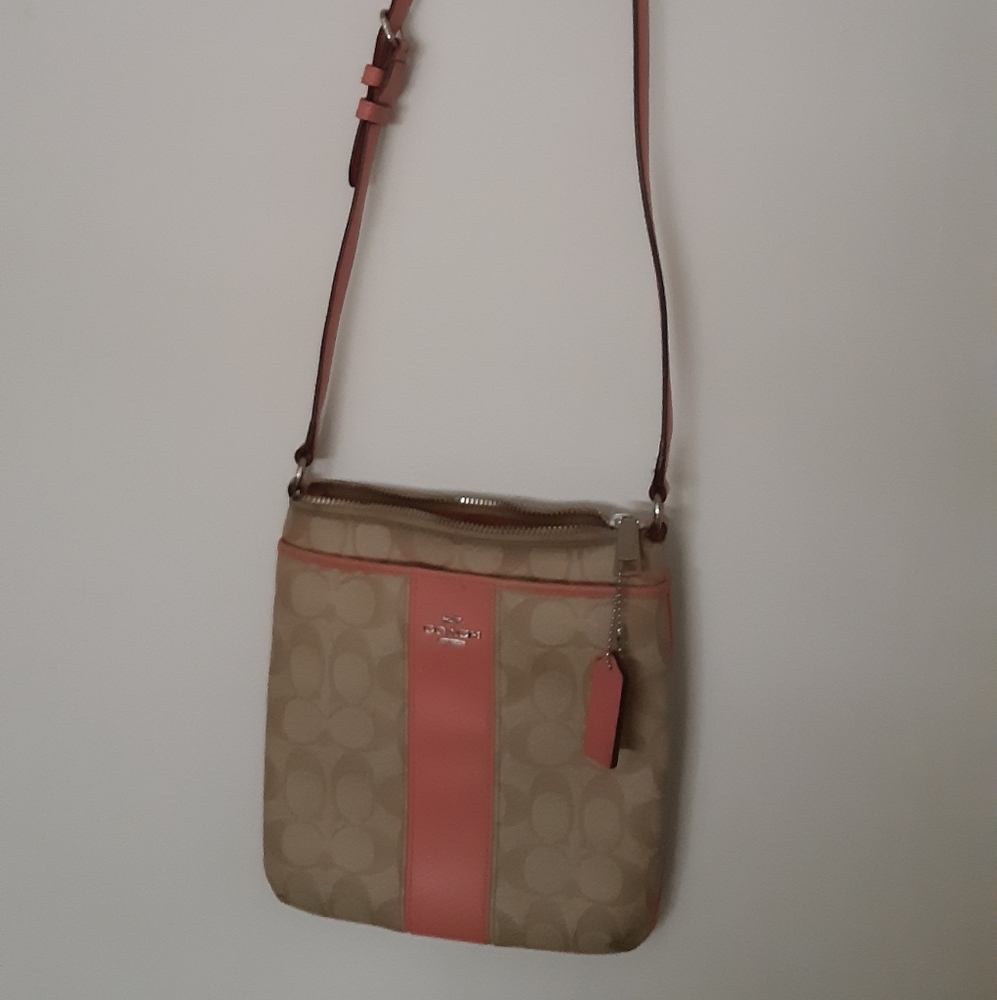 Coach cross body bag vanilla and pink color